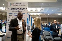 Attendees mingle with peers in the Exhibit Hall.