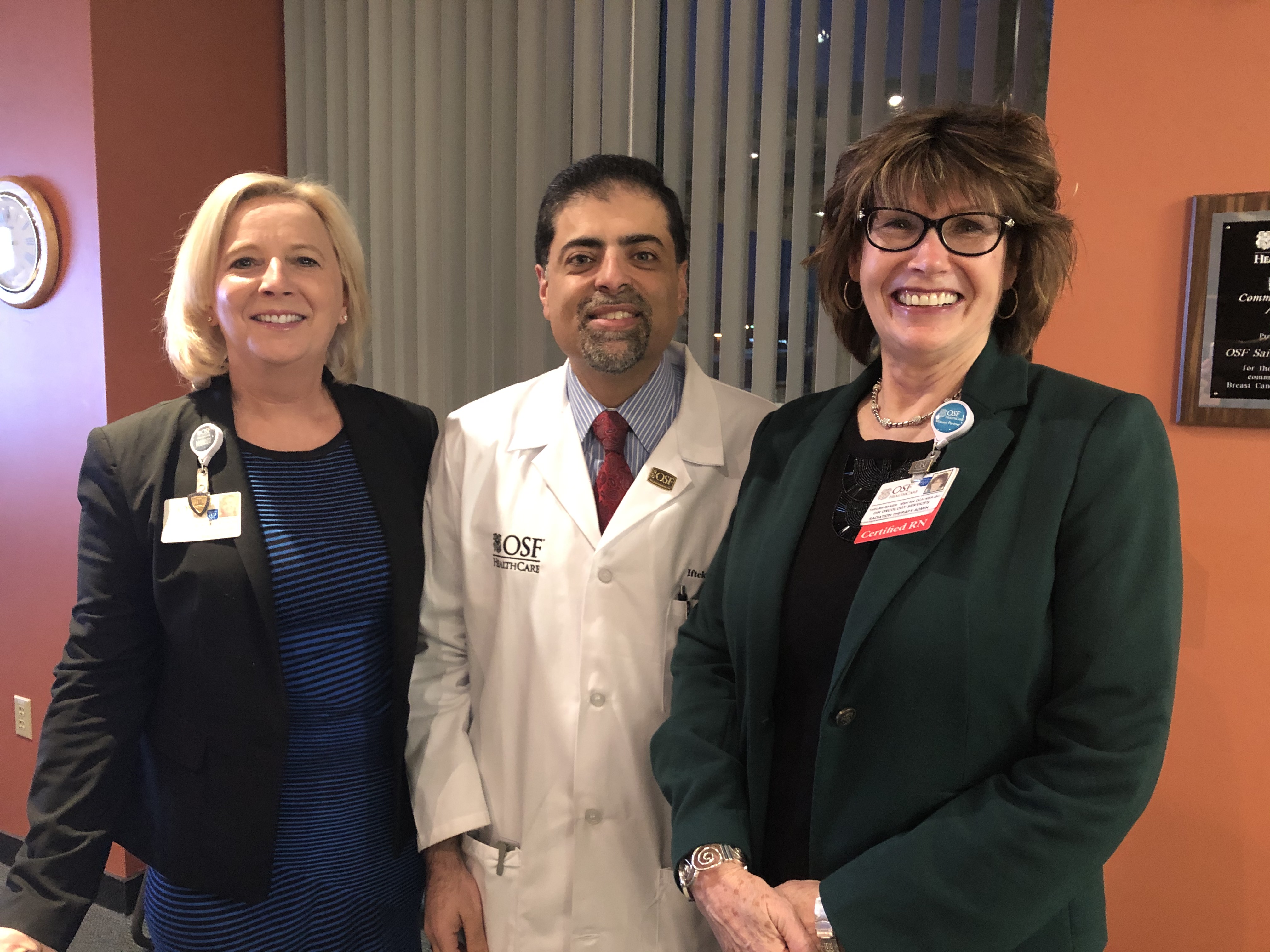 Paula Caryski, President,  OSF Health, Dr. Iftekhar Ahmad, Radiation Oncologist, and Thelma Baker, Director of Oncology
